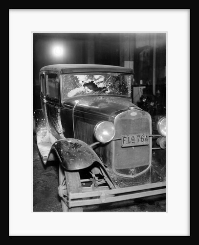 News photo of bullet-riddled automobile in Chicago, ca. 1934 by Anonymous