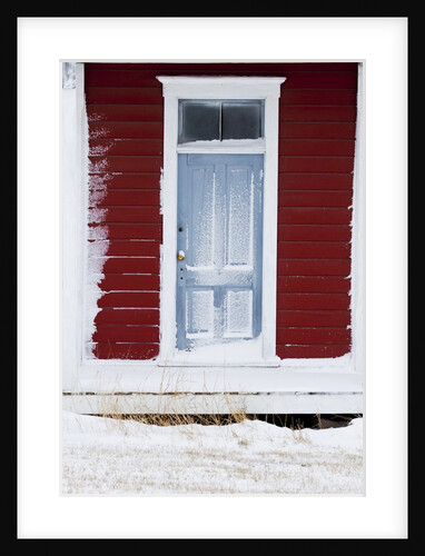 Front door of old school house with snow by Anonymous