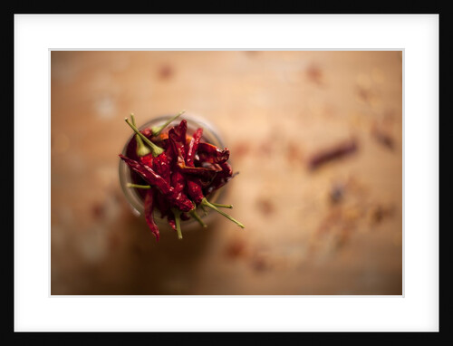 Dried red chillies in a mason jar by Anonymous