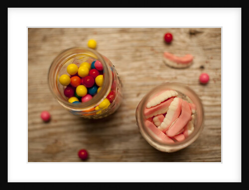 Bubble gum balls and teeth candy in mason jars by Anonymous