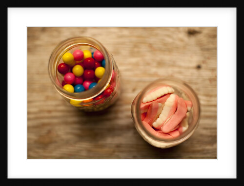 Bubble gum balls and teeth candy in mason jars by Anonymous