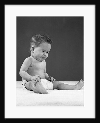 1950s baby wearing diaper and making a funny face by Anonymous