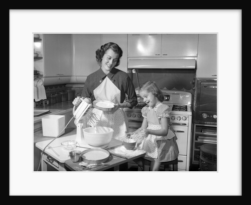 1950s mother and daughter baking a cake by Anonymous