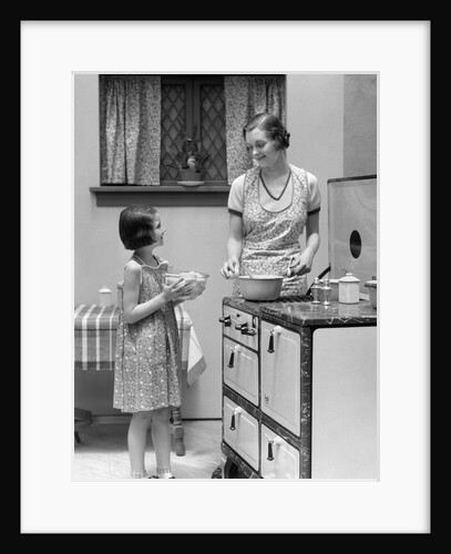 1920s young girl helping her mother to cook by Anonymous