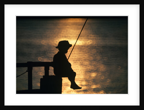 Silhouette of child fishing off a dock at sunset by Anonymous