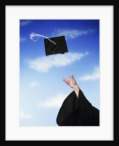 Graduate tossing mortarboard hat into the air by Anonymous