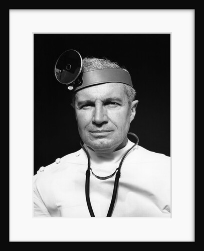 1940s portrait of senior doctor wearing ophthalmoscope by Anonymous