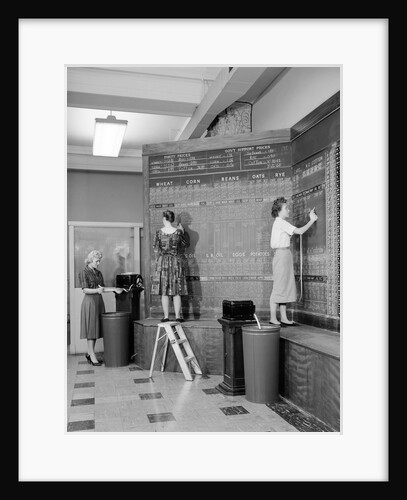 1950s 1960s women at chalkboard in brokerage house by Anonymous