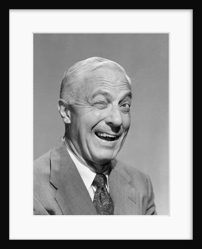 1950s senior businessman winking by Anonymous