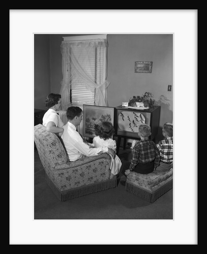 1950s family watching television by Anonymous