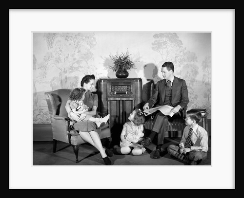 1930s 1940s family of five listening to the radio by Anonymous