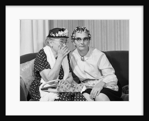 1960s two senior women gossiping by Anonymous