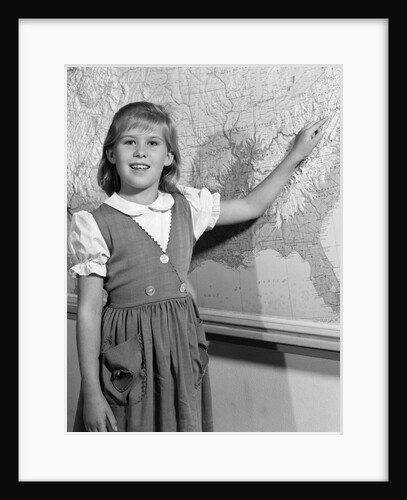 1960s school girl pointing to map of the USA by Anonymous