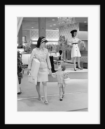 1960s 1970s mother and daughter shopping in a department store by Anonymous