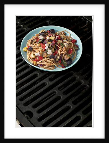 Pasta with vegetables on the grill by Anonymous