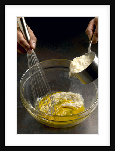 Adding hot rice to egg yolks by Anonymous