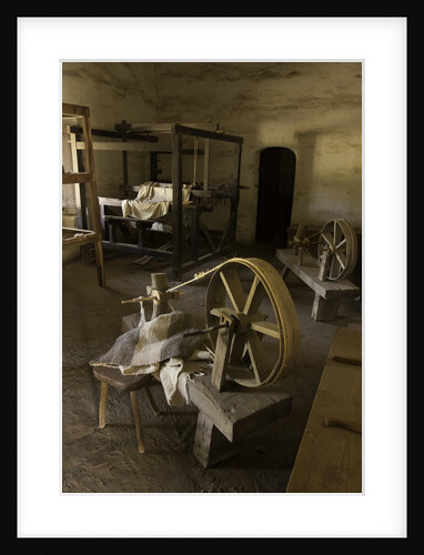 Spinning wheel and looms at La Purisima Mission in Lompoc California by Anonymous