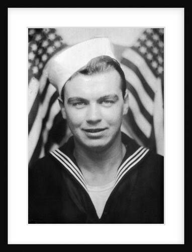 Photo booth portrait of WWII sailor, ca. 1943. by Anonymous