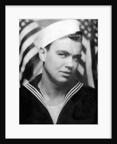Photo booth portrait of WWII sailor, ca. 1943. by Anonymous