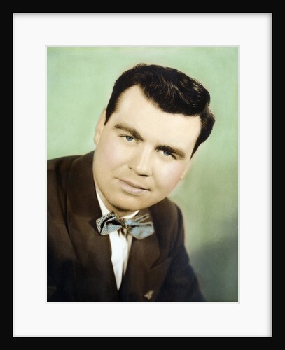 Mature man colorized studio portrait, ca. 1955. by Anonymous