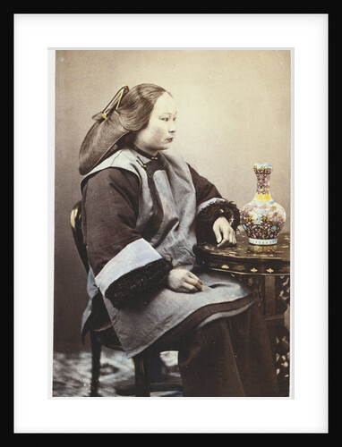 A hand tinted photograph of a young Chinese woman by Anonymous