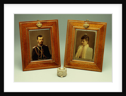 A pair of hand-coloured photos of Tsar Nicholas II & Alexandra and a cylindrical bowentie silver-mounted bell-push, marked Faberge by Anonymous