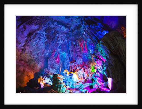 Multi Colored Lights in the Reed Flute Cave by Anonymous