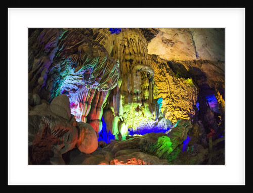 Multi Colored Lights in the Reed Flute Cave by Anonymous