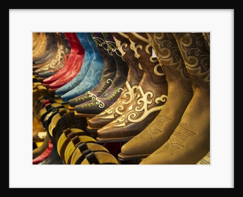 Line up of new cowboy boots in Old Scottsdale by Anonymous
