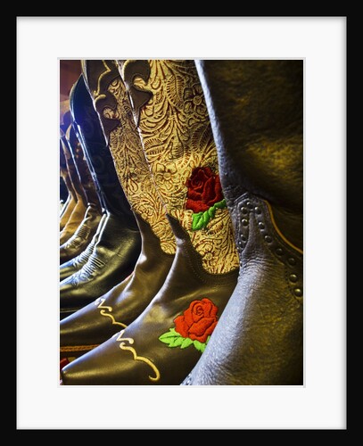 Line up of new cowboy boots in Old Scottsdale by Anonymous