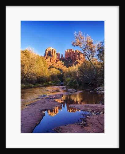 Red Rock Mountains near Red Rock Crossing with reflections in river by Anonymous
