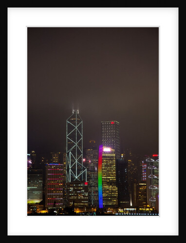 Nightly Light Show of The City of Hong Kong Draped in Fog by Anonymous