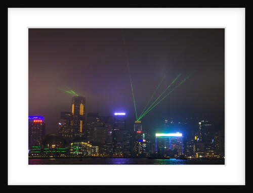 Nightly Light Show of The City of Hong Kong Draped in Fog by Anonymous