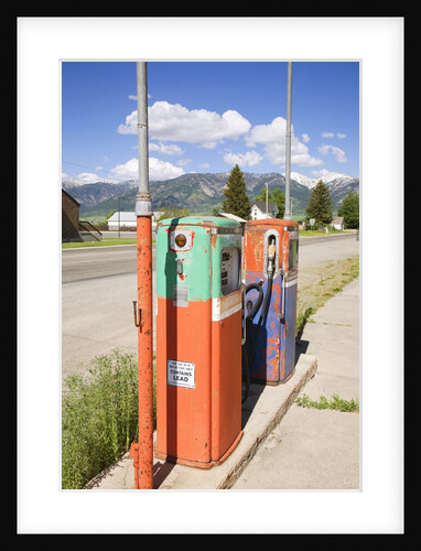 Multi-colored antique gas tanks, Idaho by Anonymous