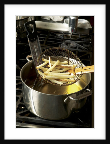 French fries in oil by Anonymous