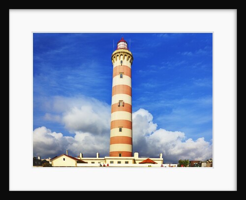 Barra Lighthouse, Costa Nova, Aveiro with large clouds by Anonymous