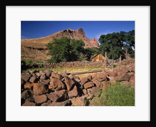 Stone corral fence and barn by Anonymous