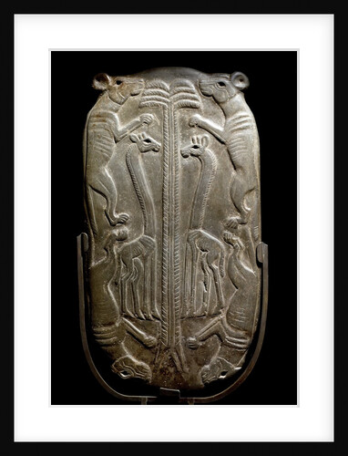 Ancient Egyptian cosmetic palette with animal motif by Anonymous