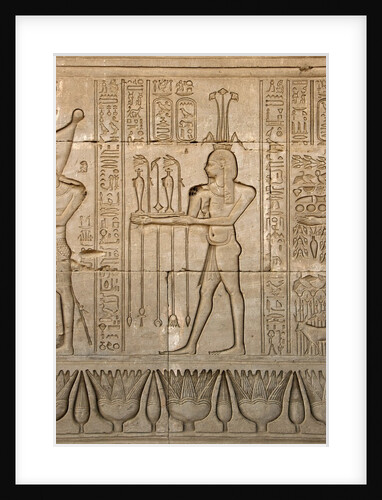 Ancient Egyptian sunken relief depicting the god of Nile, Hapy, and hieroglyphs by Anonymous