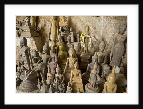 Buddha statues in Pak Ou caves outside of Luang Prabang, Laos by Anonymous