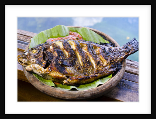 Grilled nila fish, served with banana leave by Anonymous