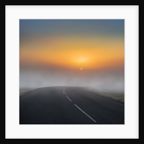 Empty road with fog and sunset. by Anonymous