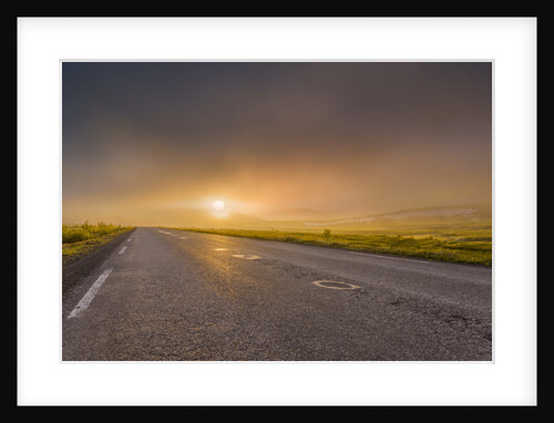 Empty road with fog and sunset. by Anonymous