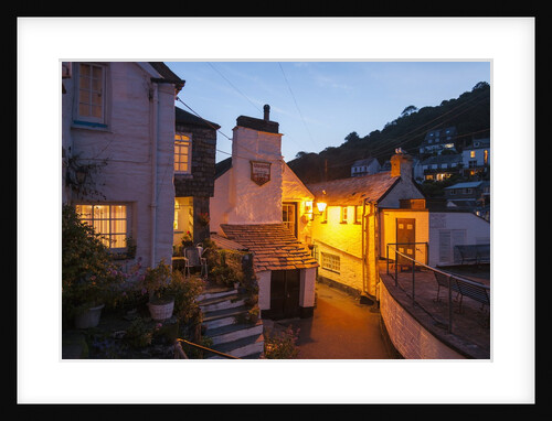 Polperro is a village with beautiful ancient houses along a canal by Anonymous