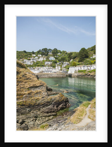 Polperro is a village with beautiful ancient houses along a canal by Anonymous