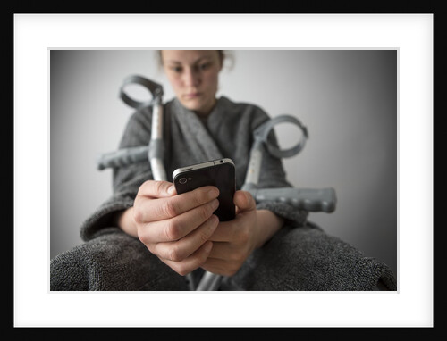 Woman seated with crutches by Anonymous