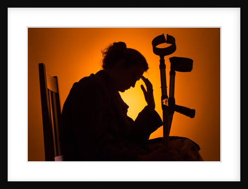 Woman seated with crutches by Anonymous