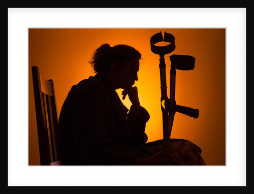 Woman seated with crutches by Anonymous