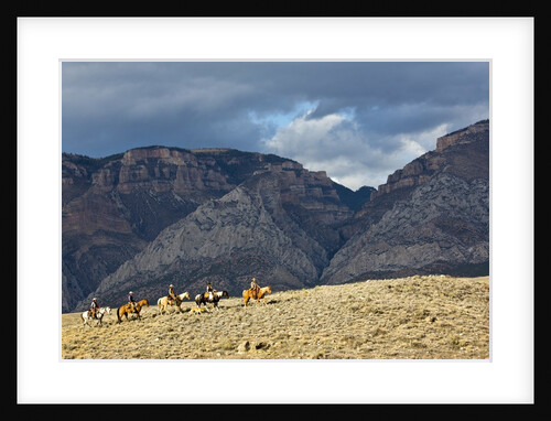 Cowboys and Cowgirls riding along the hills of the Big Horn Mountains by Anonymous