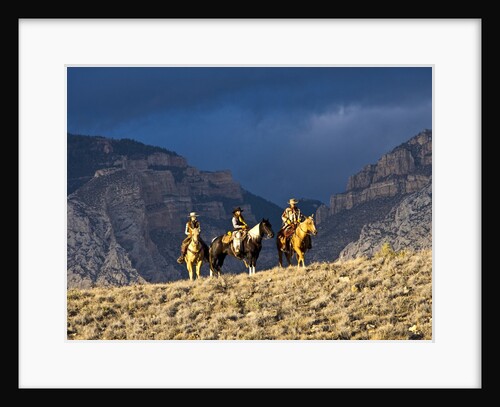 Cowboys and Cowgirls riding along the hills of the Big Horn Mountains by Anonymous
